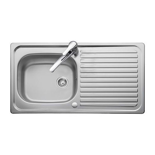 Stainless steel kitchen sink with drainboard on a white background
